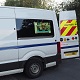 Mobile digital van display installed in a commercial vehicle with open rear doors