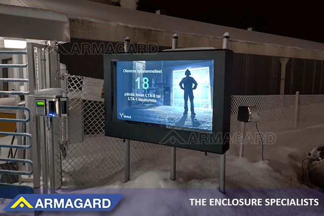 55" landscape outdoor digital signage enclosure installed next to a ski-lift